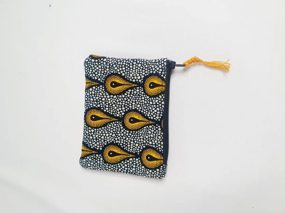 Pochette zippée en wax orange et bleu cousue main